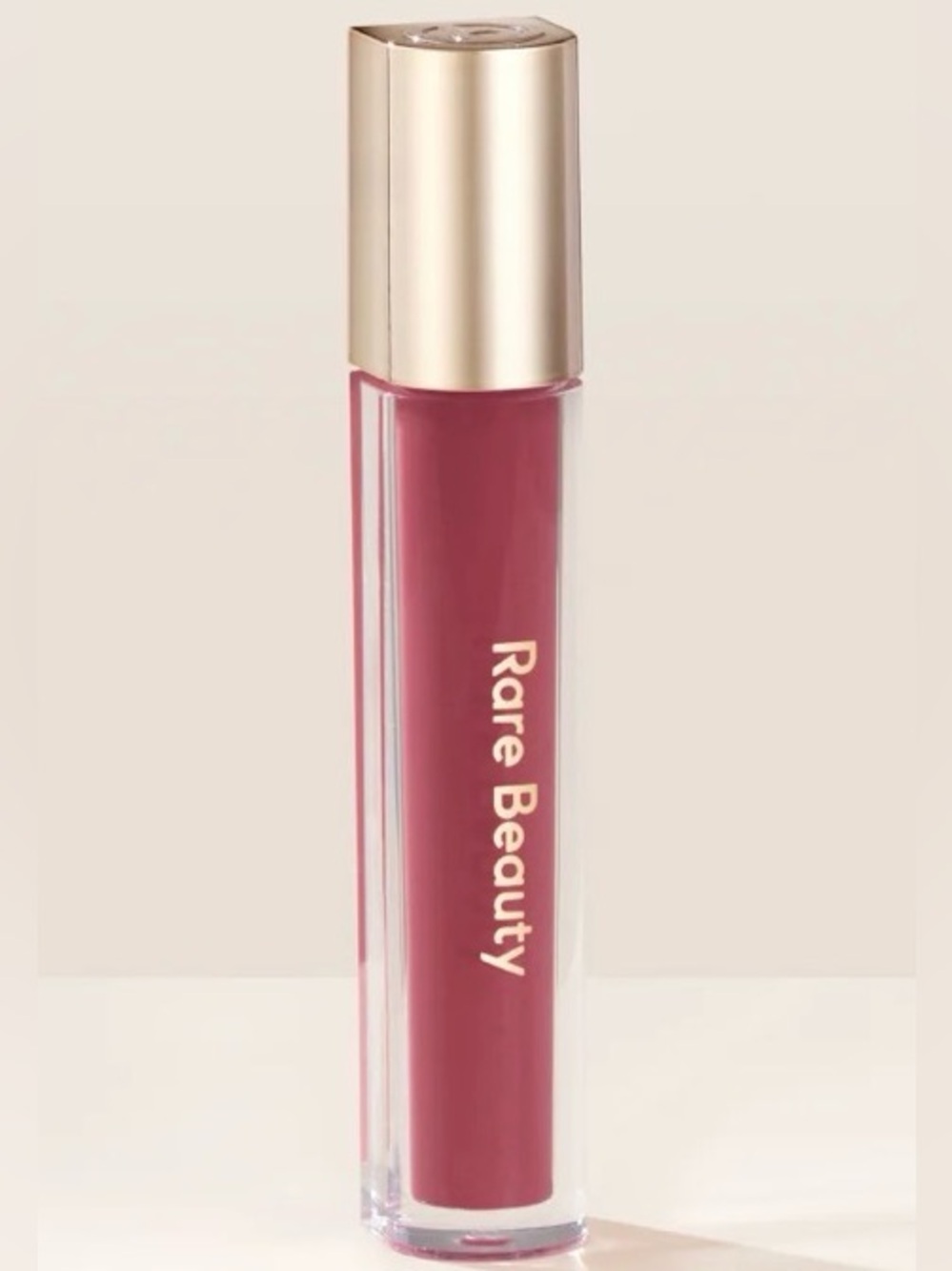 Rare Beauty Stay Vulnerable Glossy Lip Balm in the shade "Nearly Mauve".